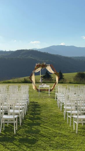 Outdoor wedding ceremony set up in the mountains
